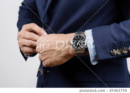 wristwatch on wrist 85463759