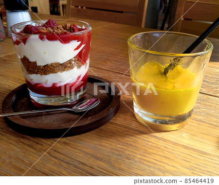 Delicious mango passion fruit smoothie Delicious mango passion fruit smoothie 85464419