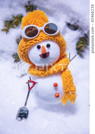 Night game lights and handmade snowman 85466239