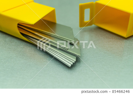 New blades for stationery knife. A pack of spare stationery blades. Selective focus, copy space 85466246