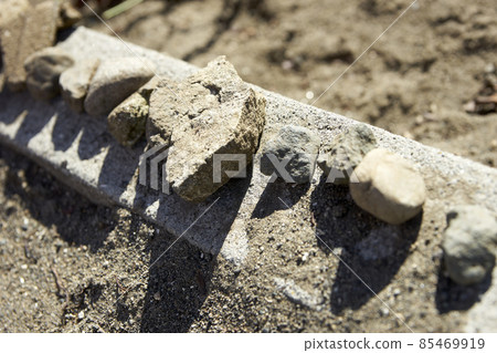 Rows of pebbles, line up, rows, up Rows of pebbles, line up, rows, up 85469919