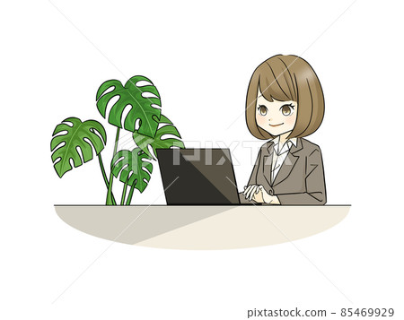 一個穿著西裝使用筆記本電腦的女人 85469929