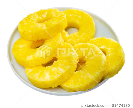 Pineapple rings. Fruit dessert. Isolated over white background 85474180