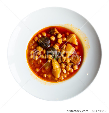 Chickpea soup with chorizo and potatoes 85474352