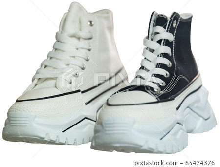 Keds isolated over white background Keds isolated over white background 85474376