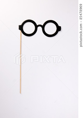 Black round eyewear spectacle frame shape paper die cut selfie portrait party fun paper prop sticker stick on white background Black round eyewear spectacle frame shape paper die cut selfie portrait party fun paper prop sticker stick on white background 85478969