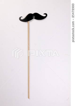 Black moustache shape paper die cut selfie portrait party fun paper prop sticker stick on white background Black moustache shape paper die cut selfie portrait party fun paper prop sticker stick on white background 85478980