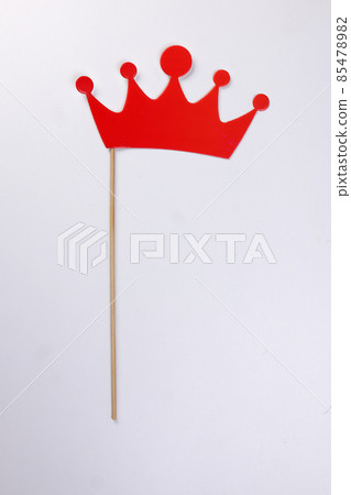 Red crown shape paper die cut selfie portrait party fun paper prop sticker stick on white background  85478982