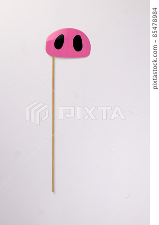 Pink pig nose piggie shape paper die cut selfie portrait party fun paper prop sticker stick on white background  85478984