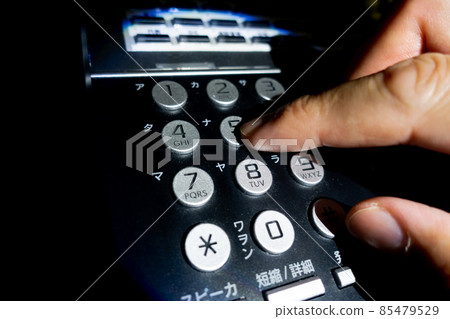 Image of a scammer making a phone call Image of a scammer making a phone call 85479529