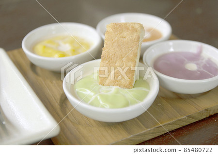 Slice steamed bread and pandan custard, Thai dessert 85480722