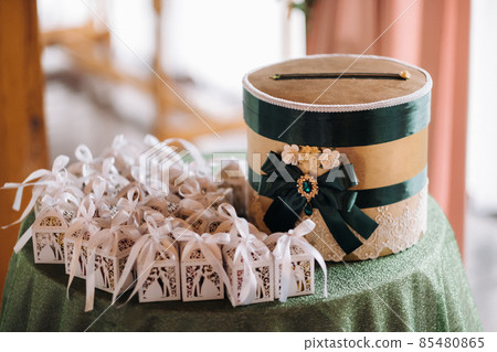 gifts for guests at the wedding ceremony 85480865
