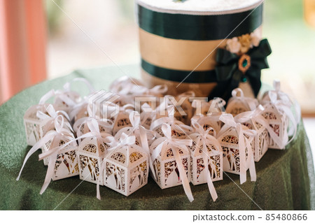 gifts for guests at the wedding ceremony 85480866