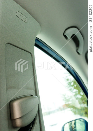 airbag in car interior near seat belt close-up 85482203