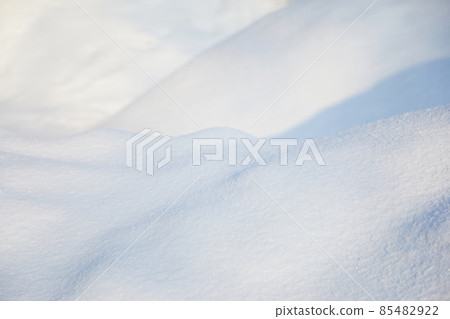 Winter snow background. Snowy white texture. Snowflakes. Winter snow background. Snowy white texture. Snowflakes. 85482922