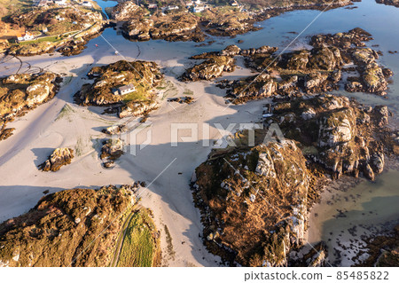 The beautiful Cloughglass bay and beach by Burtonport in County Donegal - Ireland The beautiful Cloughglass bay and beach by Burtonport in County Donegal - Ireland 85485822