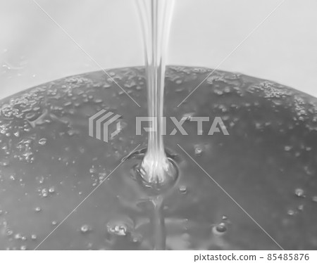 Drop of bee honey drip from hexagonal honeycombs Drop of bee honey drip from hexagonal honeycombs 85485876