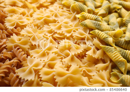 Different types of pasta as background, closeup 85486640