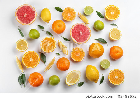 Flat lay composition with tangerines and different citrus fruits on white background Flat lay composition with tangerines and different citrus fruits on white background 85488652