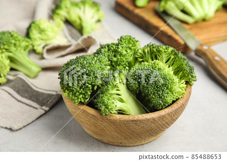 Fresh green broccoli on light table. Organic food Fresh green broccoli on light table. Organic food 85488653
