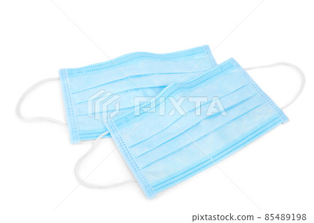 Blue medical face masks isolated on white Blue medical face masks isolated on white 85489198