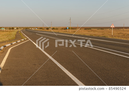 empty asphalt road, Kazakhstan 85490324