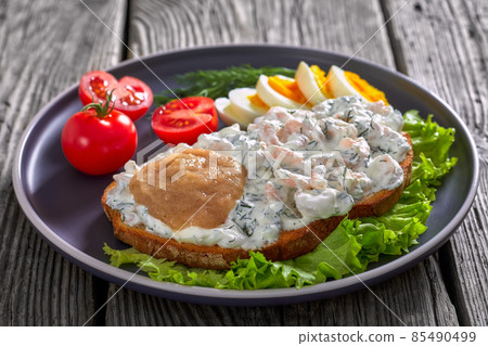 danish smorrebrod with shrimps, mayo, roe, and egg 85490499