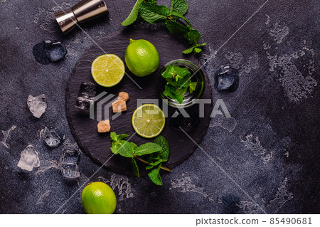 Fresh tasty ingrediens for delicious mojito cocktail Fresh tasty ingrediens for delicious mojito cocktail 85490681