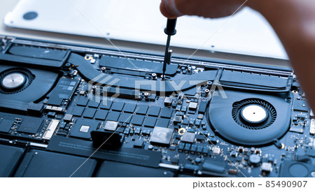Maintenance pc. Maintenance repair engineer support. Computer technician service with laptop on hardware background. Electronic technology development concept. Maintenance pc. Maintenance repair engineer support. Computer technician service with laptop on hardware background. Electronic technology development concept. 85490907