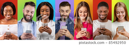 Diverse Happy People Messaging On Smartphones While Standing Over Colorful Backgrounds Diverse Happy People Messaging On Smartphones While Standing Over Colorful Backgrounds 85492950