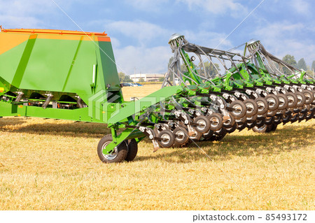 Modified agricultural cultivator and device for soil fertilization and optimal conditioning of the root zone in an agricultural field. Copy space. 85493172