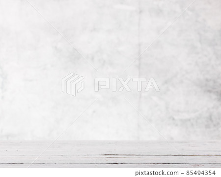 Empty light gray background with white rustik wooden table for product presentation Empty light gray background with white rustik wooden table for product presentation 85494354