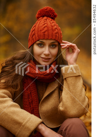 Beautiful autumn portrait of woman in forest Beautiful autumn portrait of woman in forest 85494632