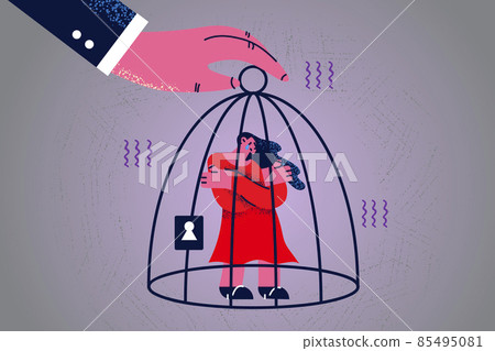 Dominant man hold crying woman in birdcage Dominant man hold crying woman in birdcage 85495081