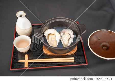 Delicious steamed oysters and hot sake in winter Delicious steamed oysters and hot sake in winter 85498394