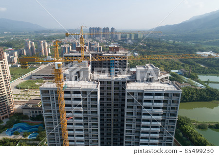 Aerial view of multistory apartment construction site in China Aerial view of multistory apartment construction site in China 85499230
