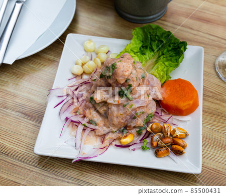 Peruvian ceviche from alaska pollock with onion and garlic Peruvian ceviche from alaska pollock with onion and garlic 85500431