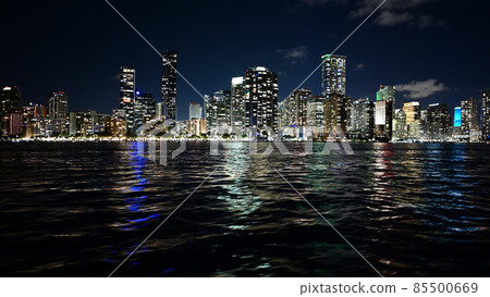 City of Miami, Florida skyline reflected in Biscayne Bay at night. City of Miami, Florida skyline reflected in Biscayne Bay at night. 85500669