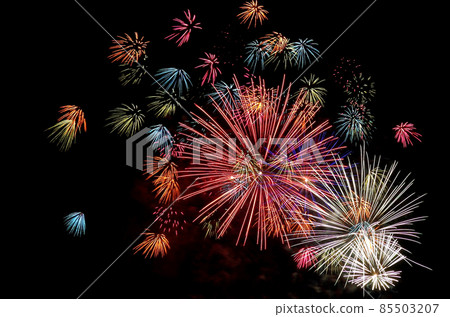 Fireworks dancing in the night sky Fireworks dancing in the night sky 85503207