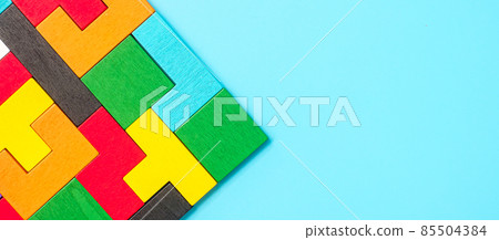 colorful wood puzzle pieces on blue background, geometric shape block. Concepts of logical thinking, Conundrum, solutions, rational, strategy, world logic day and Education colorful wood puzzle pieces on blue background, geometric shape block. Concepts of logical thinking, Conundrum, solutions, rational, strategy, world logic day and Education 85504384