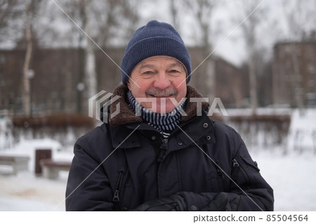 Close up portrait of smiling senior man. Close up portrait of smiling senior man. 85504564