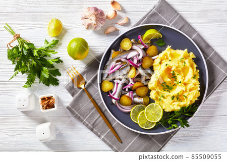 sprat red onion and pickles salad with potato mash 85509055