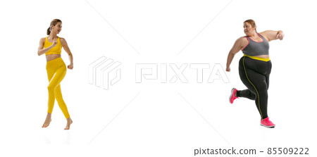 Happy young slim girl and plus-size woman wearing sport uniform isolated on white background. Concept of healthy lifestyle, fitness, sport, nutrition and weight loss. 85509222