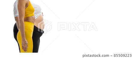 Cropped image of slim girl and plus-size woman wearing sport uniform isolated on white background. Concept of fitness, sport, nutrition and weight loss. 85509223