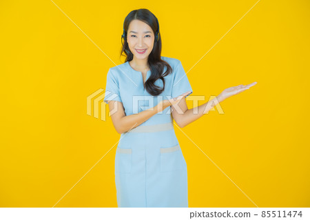 Portrait beautiful young asian woman with call center customer care service center Portrait beautiful young asian woman with call center customer care service center 85511474