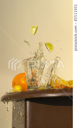 splintered Cup of green tea with splashes splintered Cup of green tea with splashes 85511931