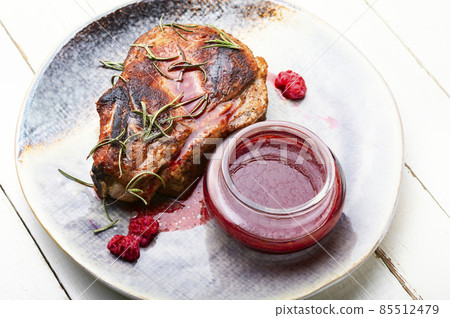 Fried steak with raspberry sauce Fried steak with raspberry sauce 85512479