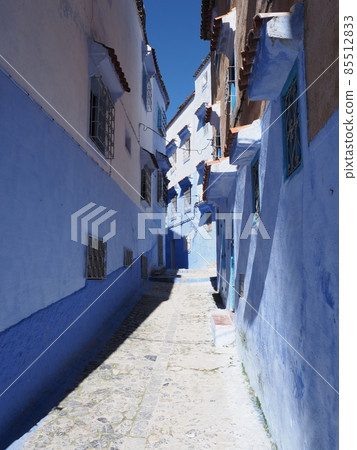 Cosy moroccan alley in Chefchaouen city in Morocco - vertical Cosy moroccan alley in Chefchaouen city in Morocco - vertical 85512833