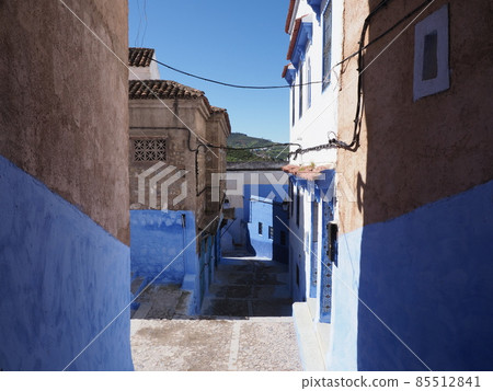 Narrow alley moroccan alley in african Chefchaouen city in Morocco Narrow alley moroccan alley in african Chefchaouen city in Morocco 85512841