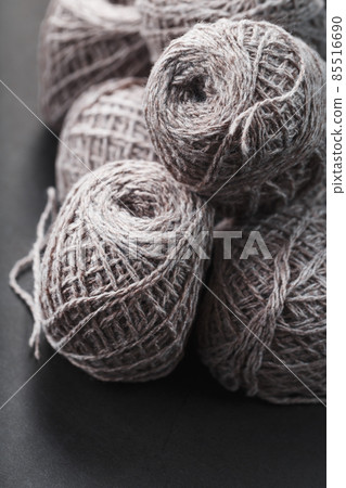Light brown yarn made of natural sheep wool. Light brown yarn made of natural sheep wool. 85516690